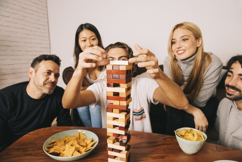 joyful-friends-playing-tabletop-game-2.jpg