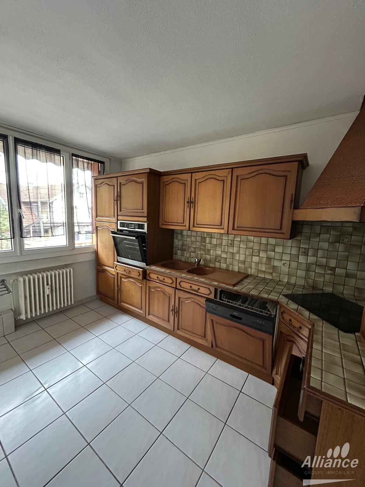 Appartement T3 avec balcon, garage et cave à Vieux-Charmont